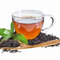 Black Tea · A cup of earthy, stronger, bolder and notes of warm spice black tea.