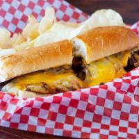 Cheesesteak · Thin-sliced steak with grilled onions, topped with swiss and American cheeses.