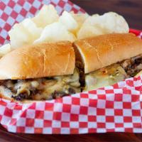 Beg for Mercy Philly Steak · We start with rib-eye steak shaved thin and topped with grilled onions, roasted Serrano pepp...