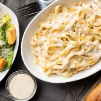 Fettuccine Alfredo Lunch Combo · Lunch portion of fettuccine covered in our classic Alfredo sauce with shredded parmesan. Ser...