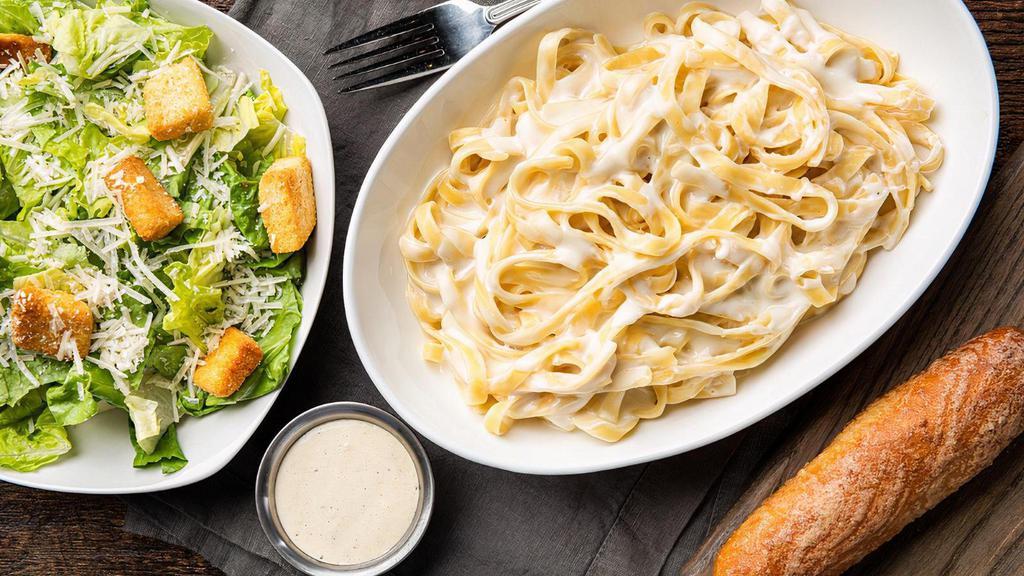 Fettuccine Alfredo Lunch Combo · Lunch portion of fettuccine covered in our classic Alfredo sauce with shredded parmesan. Served with your choice of salad and a breadstick.