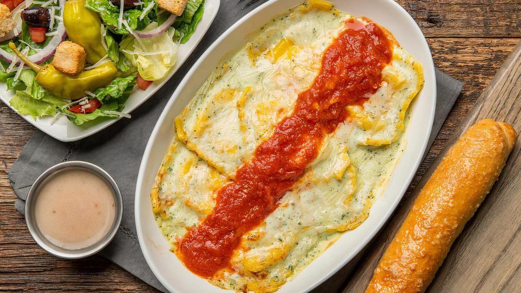 Cheese Ravioli Lunch Combo · Cheese ravioli smothered with your choice of marinara, meatsauce or pesto Alfredo sauce and topped with shredded parmesan cheese. Served with a breadstick and your choice of salad.