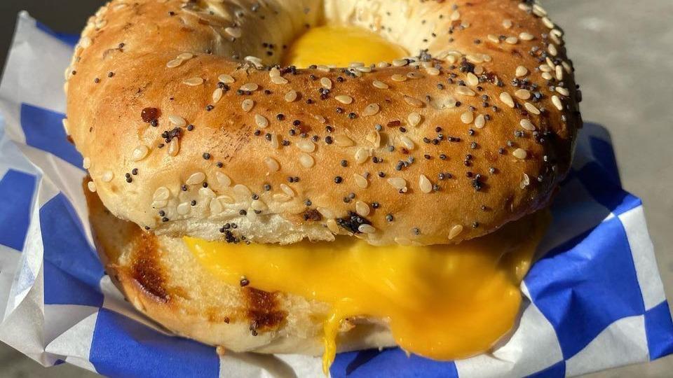 Breakfast Bagel · House egg patty, pork sausage, American cheese, on toasted plain bagel.