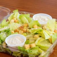 Classic Caesar Salad · Classic Caesar Salad on Romaine lettuce with croutons, Parmesan cheese, and Caesar dressing.