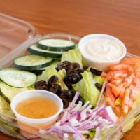 Green Salad · Lettuce, tomatoes, red onion, pickles, peppers, cucumbers and sprouts with your choice of dr...