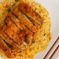 Crispy Chicken Fried Rice · Deep fried battered chicken breast served over pan fried rice with egg, green bean and carrot.