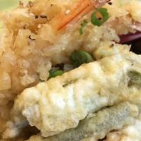 Shrimp Tempura  Roll · Shrimp tempura, avocado, cucumber with unagi sauce.