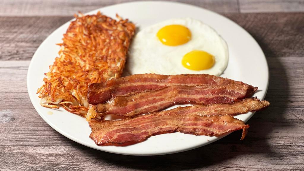 Bacon and Eggs · Thick sliced bacon, shredded hash browns and two large fresh USDA eggs, served any style.
