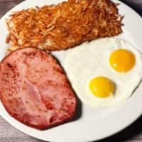 Ham and Eggs · A thick slice of sugar cured hickory smoked ham and two large fresh USDA eggs, served any st...