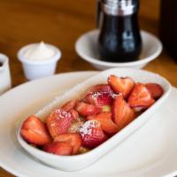 Fresh Fruit Crepes · Three delicate crepes filled and topped with luscious fresh fruit in season and lightly dust...