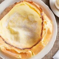 Dutch Baby · Oven-baked served with whipped butter, lemon & powdered sugar. cal 840