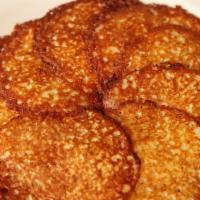 Potato Pancakes · Idaho potatoes pancakes freshly grated and cooked on the flattop. Served with applesauce and...