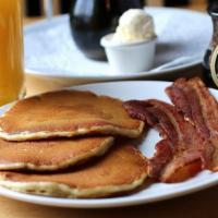 Junior Plate · Three buttermilk pancakes with your choice of two sausage links or two slices of bacon or on...