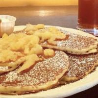 Hawaiian Pancakes · Our fresh buttermilk pancakes filled with crushed pineapple and lightly dusted with powdered...