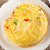 Western Omelet · Our fluffy omelet filled with diced green peppers, onions, pimientos and hickory smoked ham.