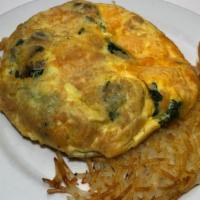 Spinach Omelet · Enjoy our fluffy omelet filled with fresh spinach, jack and cheddar cheese.