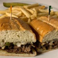 Philly Sandwich · Tender chicken or steak sauteed with green pepper and onion, topped with Swiss cheese.