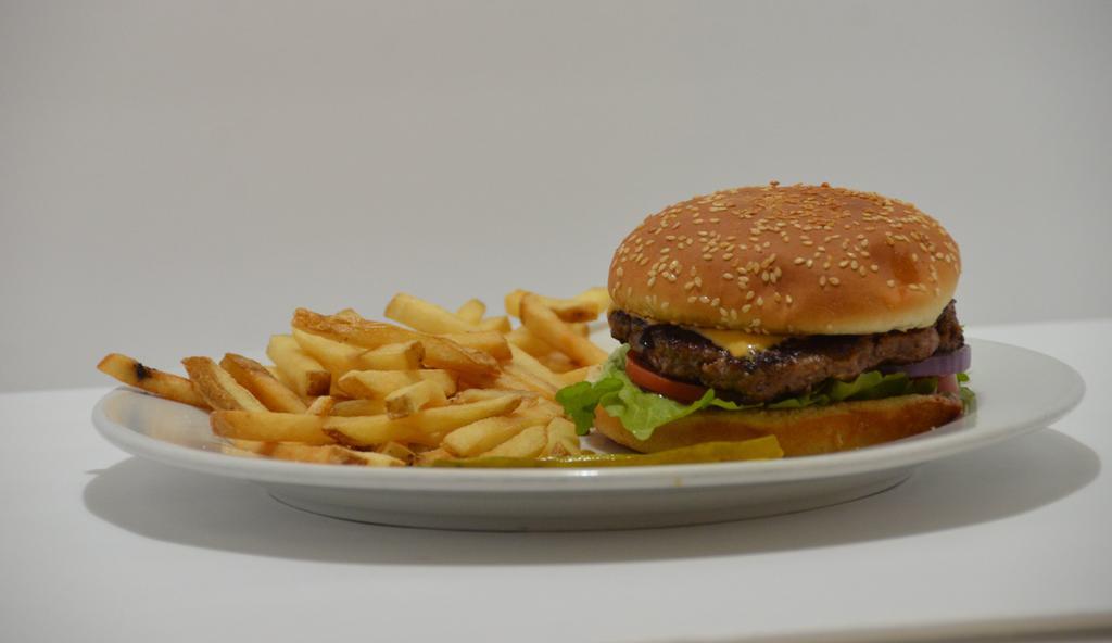 Cheese Burger · Grilled angus beef, cheese, tomato and lettuce, served your way on a burger bun.