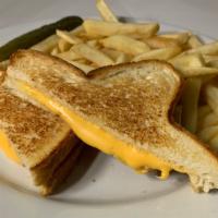 Grilled Cheese Sandwich · Grilled toast cheese sandwich, served with a choice of cheddar or Swiss cheese.
