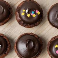 Brownie Bites · Brownie minis topped with our decadent fudge
