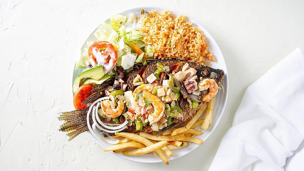 Good-Looking Fish (Pescado Guapo) · Fish topped with shrimps, octopus and crab imitation (Bañado con camarones, pulpo e imitación de jaiba).