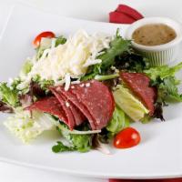 Greek Salad · Hearts of romaine topped with mixed greens, tomatoes, red onions, feta cheese, and kalamata ...