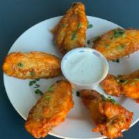 Sriracha Wings · A take on your favorite hot sauce tossed with butter, lemon zest, and cilantro. Please conta...