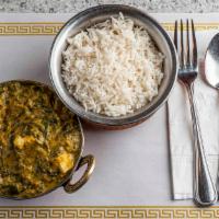 Saag Paneer · Fresh spinach and homemade cheese cooked with spices, tomatoes, and onion gravy.