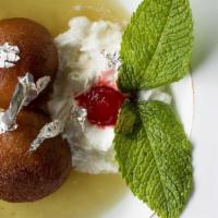 Gulab Jamuns · Homemade milk based sponge dumpling deep-fried and flavored with sweet rose flavored with gr...