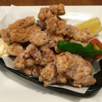 Chicken Karaage · 8pcs boneless fried chicken with side of Japanese mayonnaise, sliced lemon and tomato