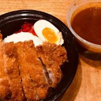 Chicken Katsu Curry · breaded  and deep-fried chicken, half-boiled egg, red pickles and white rice. curry sauce si...