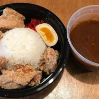 Chicken Karaage Curry · boneless fried chicken, half-boiled egg, red pickles and white rice. curry sauce side.
