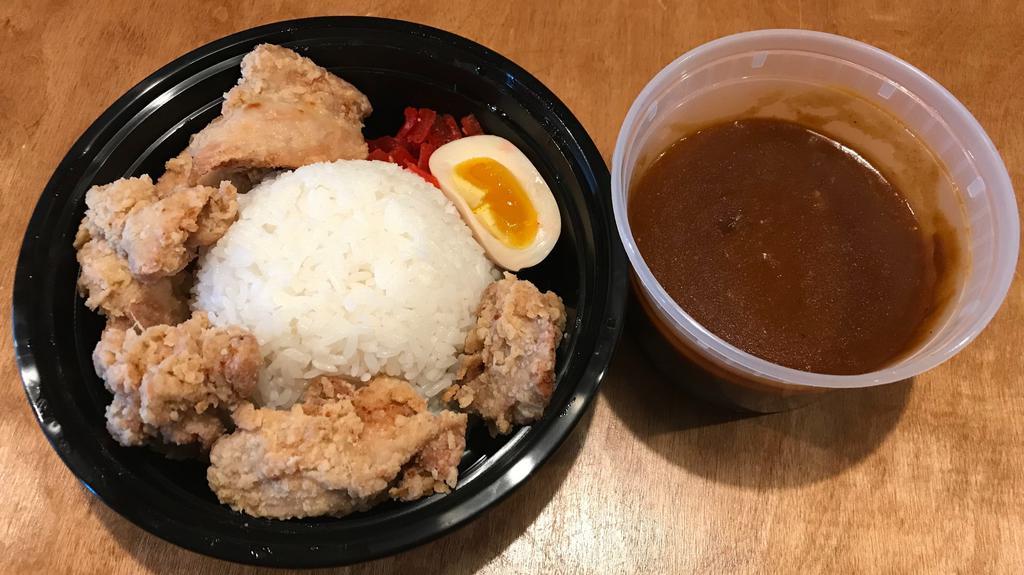 Chicken Karaage Curry · boneless fried chicken, half-boiled egg, red pickles and white rice. curry sauce side.