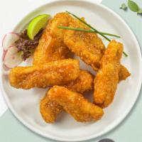 Boneless Orange Chicken Wings · Breaded and fried Halal boneless chicken wings, orange sauce, with ranch or blue cheese.