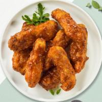 Boneless BBQ Chicken Wings · Breaded and fried Halal boneless chicken wings, BBQ sauce, with ranch or blue cheese.