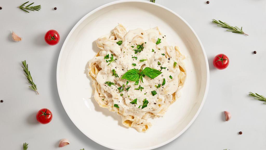 Halal Alfredo Chicken Fettuccine Pasta · Cooked in customer’s choice of Alfredo or white sauce