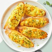 7” Garlic Bread with Cheese · 7” crispy garlic bread with melted mozzarella cheese.