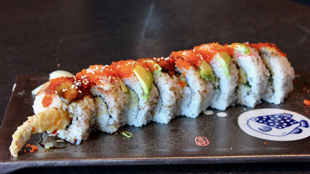 Dragon Roll · Shrimp tempura, cucumber, topped with avocado, eel, tobiko, unagi sauce.
