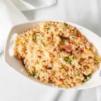 Fried Rice · Gluten-free. Wok-fried rice blended with eggs, wheat-free soy sauce, green onions, peas and ...