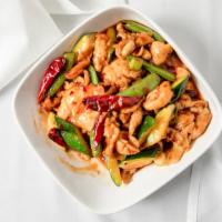 Kung Pao Chicken · Spicy - White meat chicken with snap peas, zucchini, and peanuts in chef's special sauce.