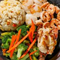 Lobster, Shrimp, & Scallop · Lobster, shrimp and scallop.