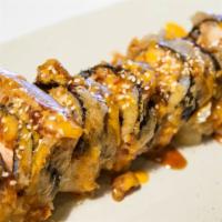 Mothra · Inside: spicy tuna. Deep fried outside: house sauce with tobiko onion, sesame.