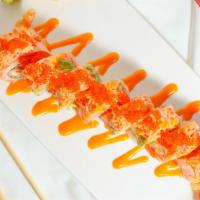 Chad’s Roll · Inside: shrimp tempura, cream cheese, spicy crab. Outside: seared salmon, avocado, tobico, s...