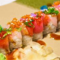 Tokyo Roll · Inside: unagi, cucumber, avocado. Outside: tuna, hamachi, unagi sauce, tobiko, and green oni...