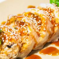 Bonanza Roll · Inside: shrimp tempura, imitation crab, cucumber. Outside: soy wrap.