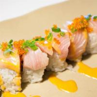 Hungry Fish Roll · Inside: spicy tuna, cucumber. Outside: hamachi, tobiko, onion spicy mayo.