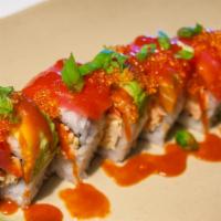 Bad Joe Roll · Inside: cucumber, shrimp tempura. Outside: tuna, avocado, tobiko, chili sauce, onion.