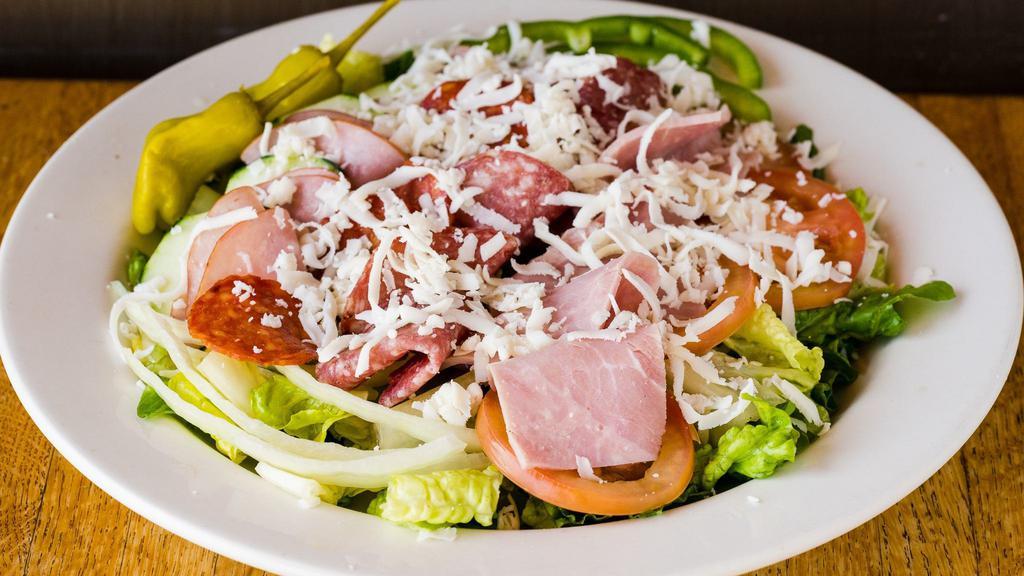 Chef Salad · Salami, Canadian bacon, and mozzarella cheese. Served with Italian, blue cheese, ranch, or Thousand Island.