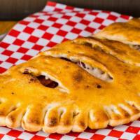 Vegetarian Special Calzone · Mozzarella and ricotta cheese, fresh spinach, mushrooms, onions, bell peppers, tomatoes, and...