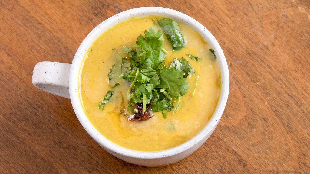 Dal Soup Bowl · A hearty bowl of spiced dal soup over quinoa and topped with cilantro, raisin chutney, and ghee (request coconut oil for a vegan option). All organic ingredients. Add avocado for an additional charge.